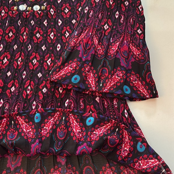 Red Patterned Top with Beaded Neckline. 3/4 length flared sleeves and flared hem - Picture 6 of 7